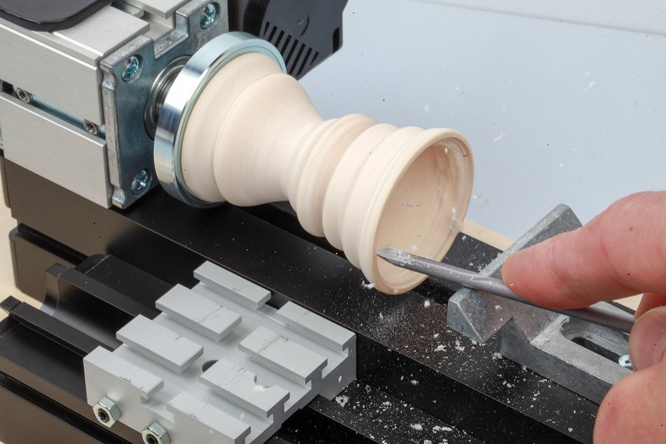 Wood lathe project egg cup holder, working on a piece of maple wood